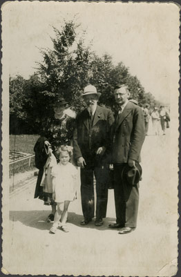 With her grandfather and father